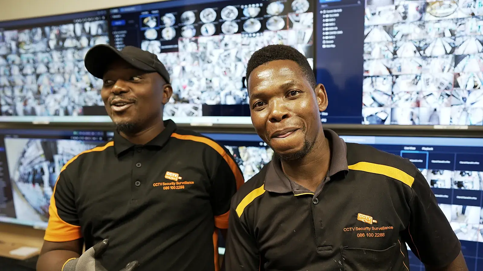 CCTV installation in Umhlanga, KwaZulu-Natal: CCTV Security Surveillance technicians at a CCTV monitoring video wall