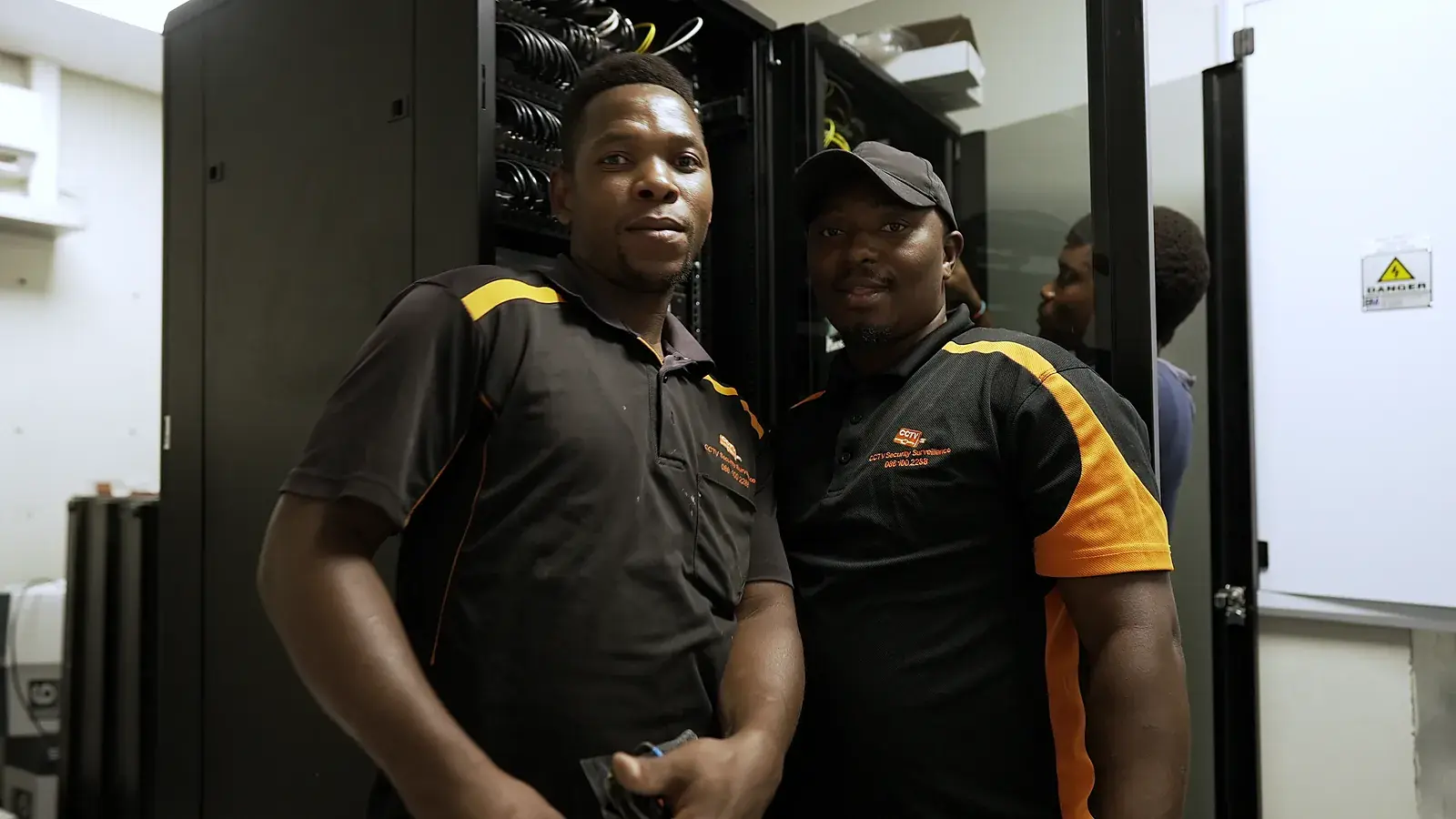 CCTV installation in Newcastle, KwaZulu-Natal: CCTV Security Surveillance technicians at a CCTV network cabinet they installed
