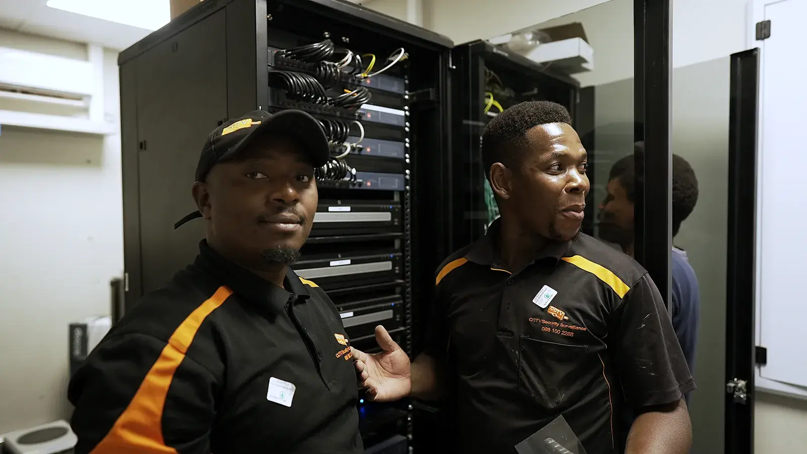 CCTV installation in Westville, KwaZulu-Natal: CCTV Security Surveillance technicians at a CCTV network cabinet they installed